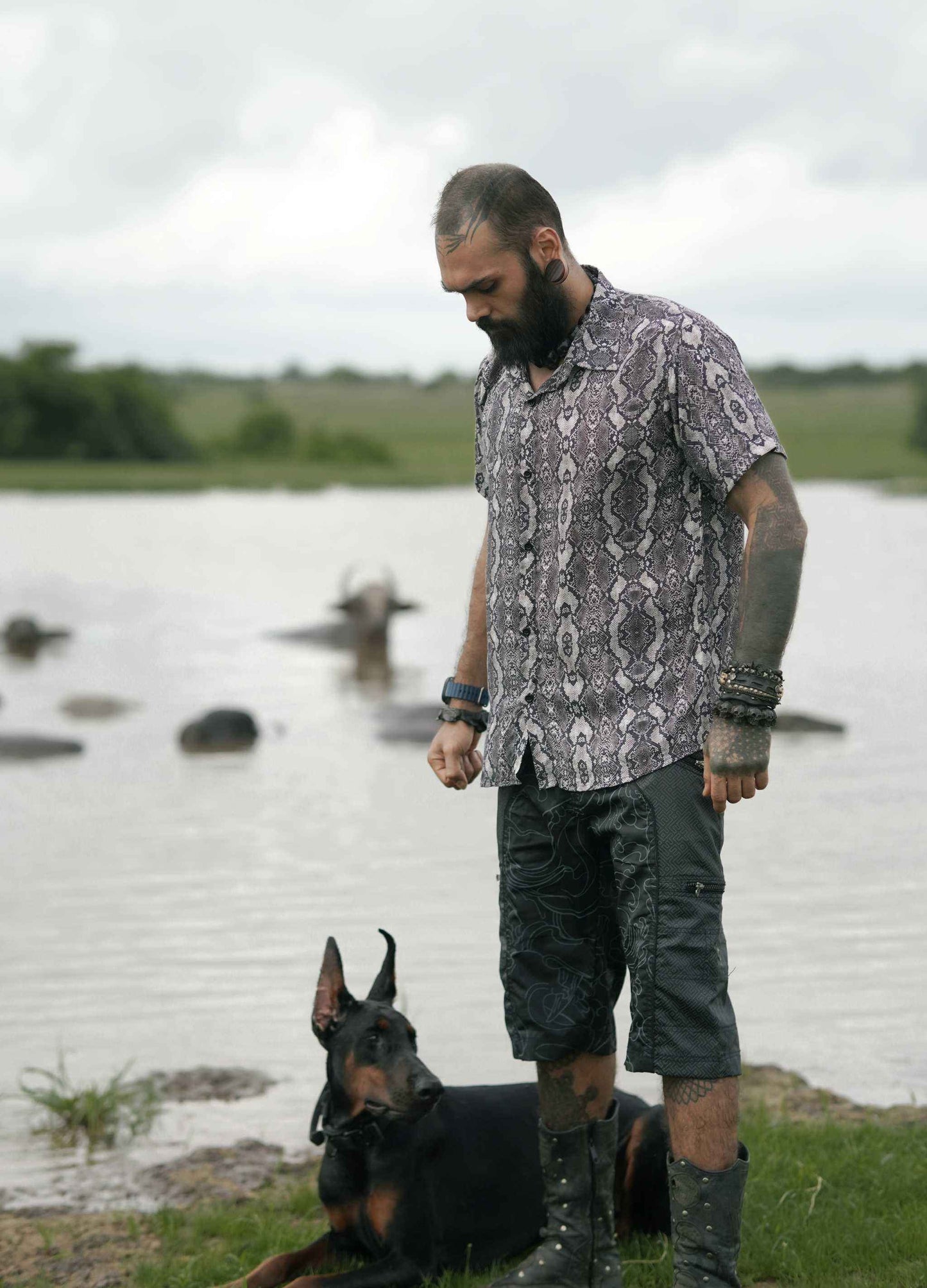 Man wearing eco-friendly bamboo shirt for men with psychedelic python abstract print