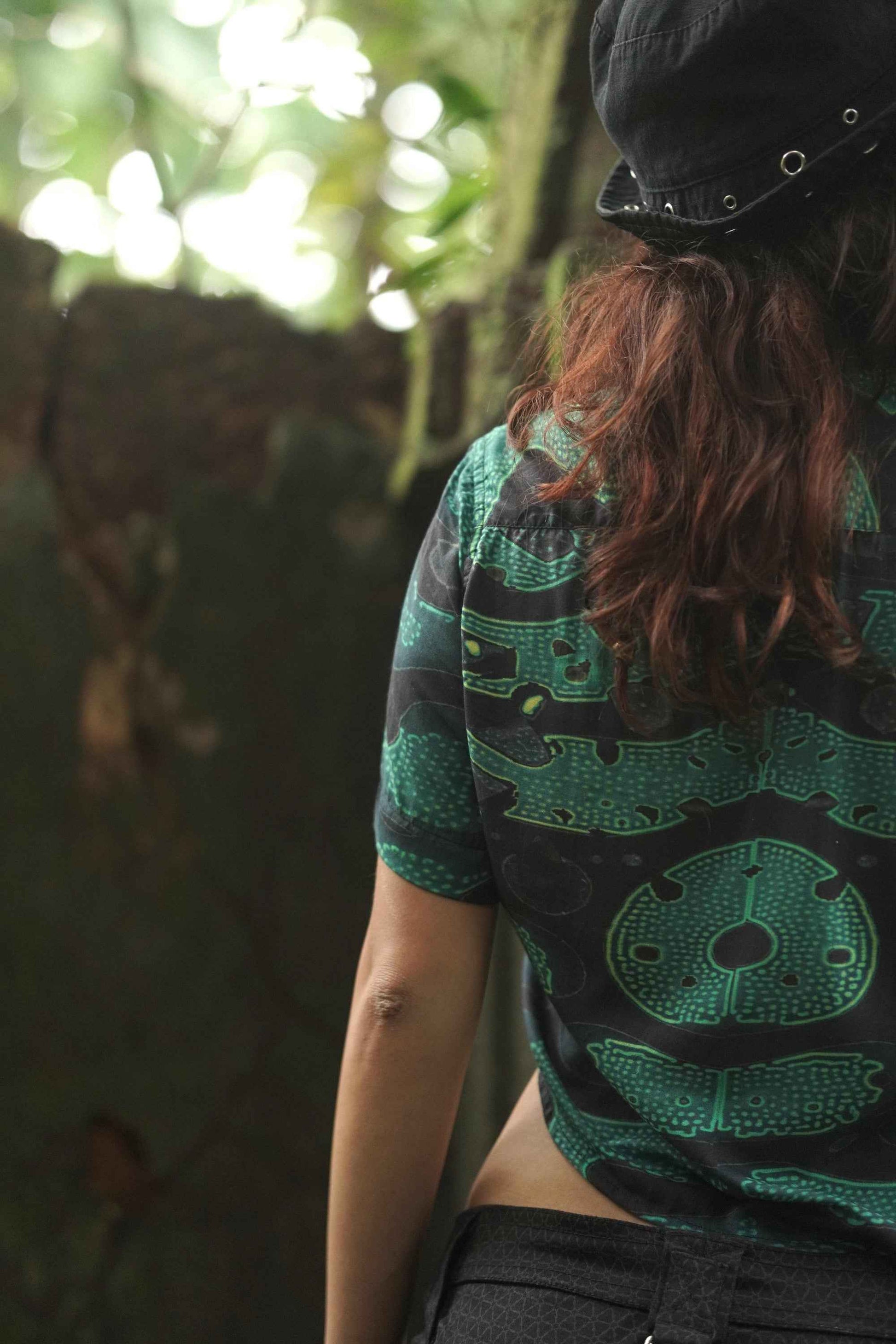 Back view of Green Wizard printed bamboo cropped shirt for women