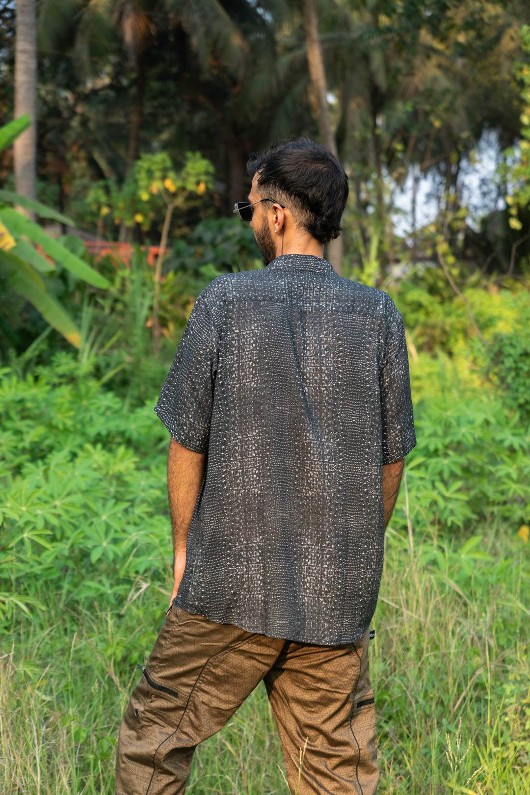 Back view of Black Illusions bamboo breathable summer shirt styled for streetwear