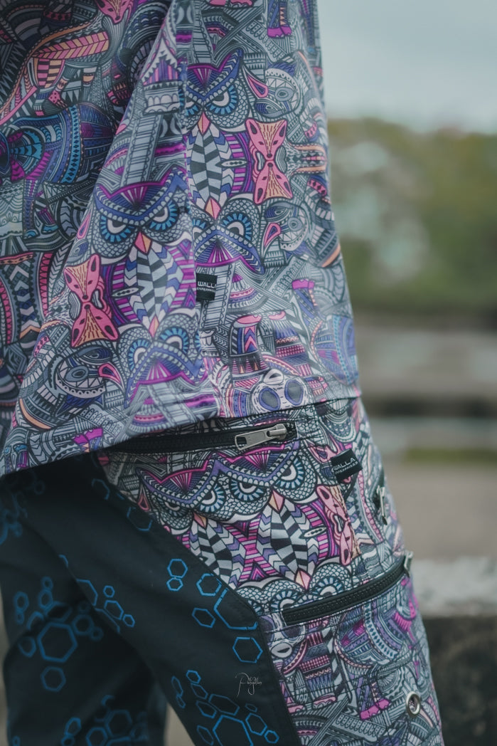 Men’s above the knee shorts showing detailed psychedelic print and secure zippered cargo pocket