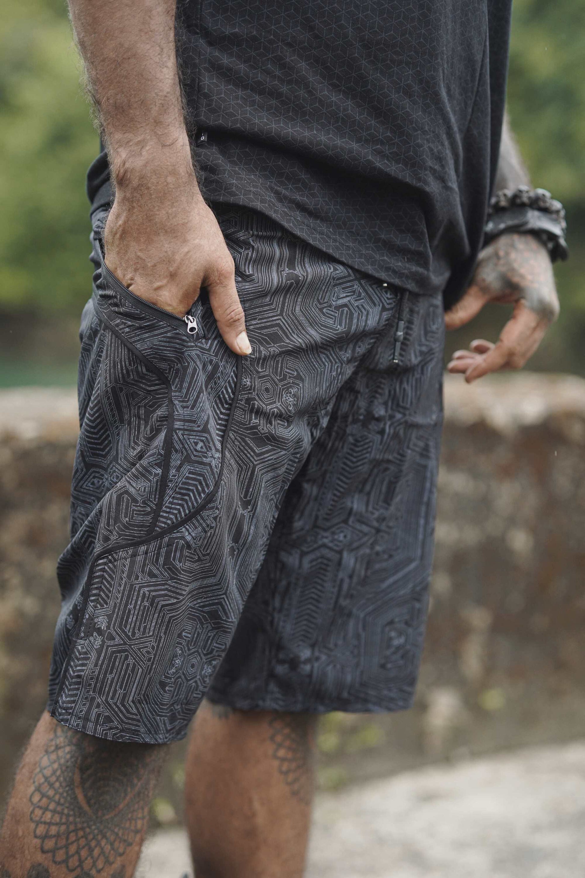 cyberpunk swim shorts for men black geometric design with zipper pocket side view