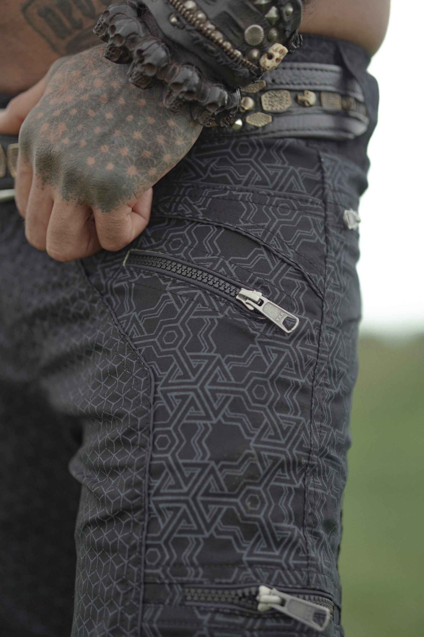 YKK zipper detail on black mens psychedelic pants