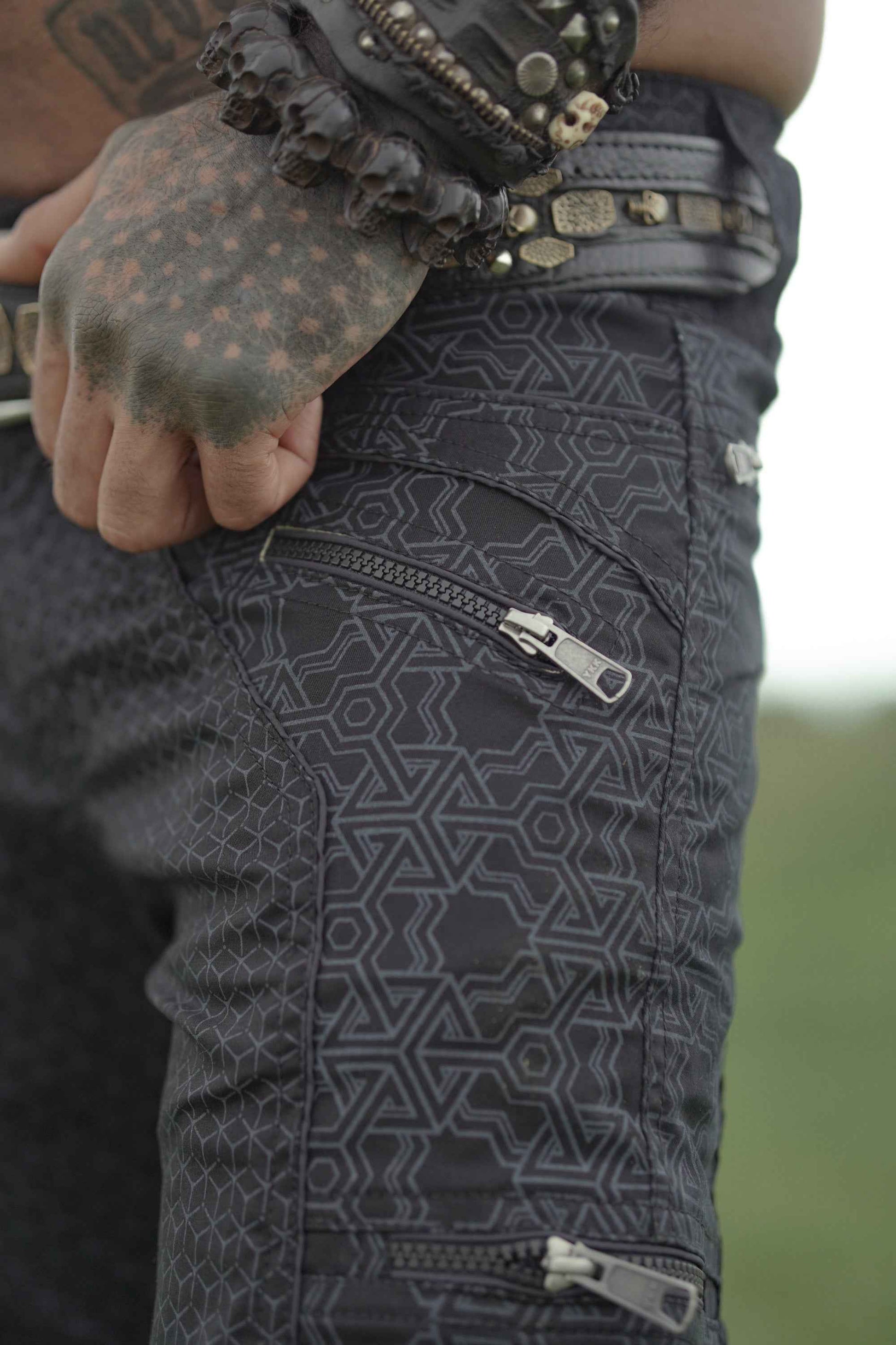 YKK zipper detail on black mens psychedelic pants