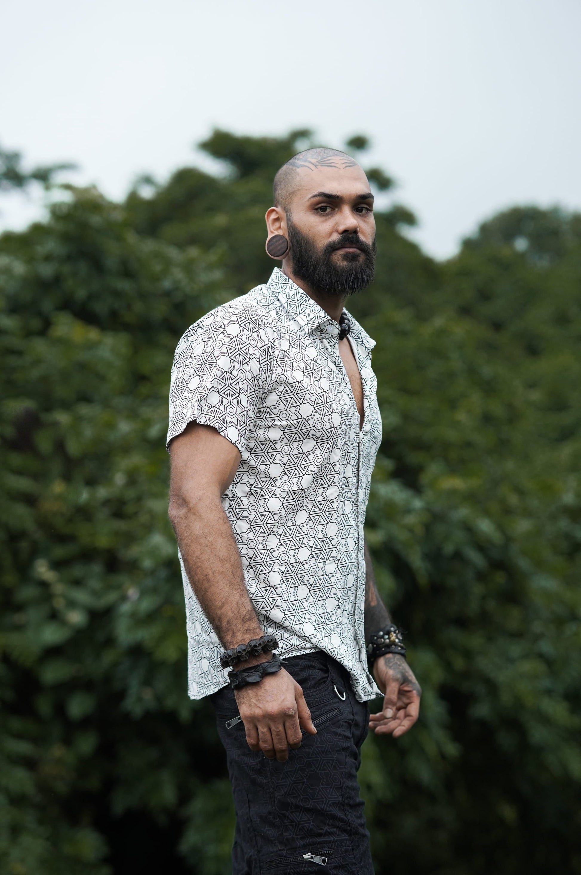 Model wearing Walla Enterprises viscose button up shirt – side angle
