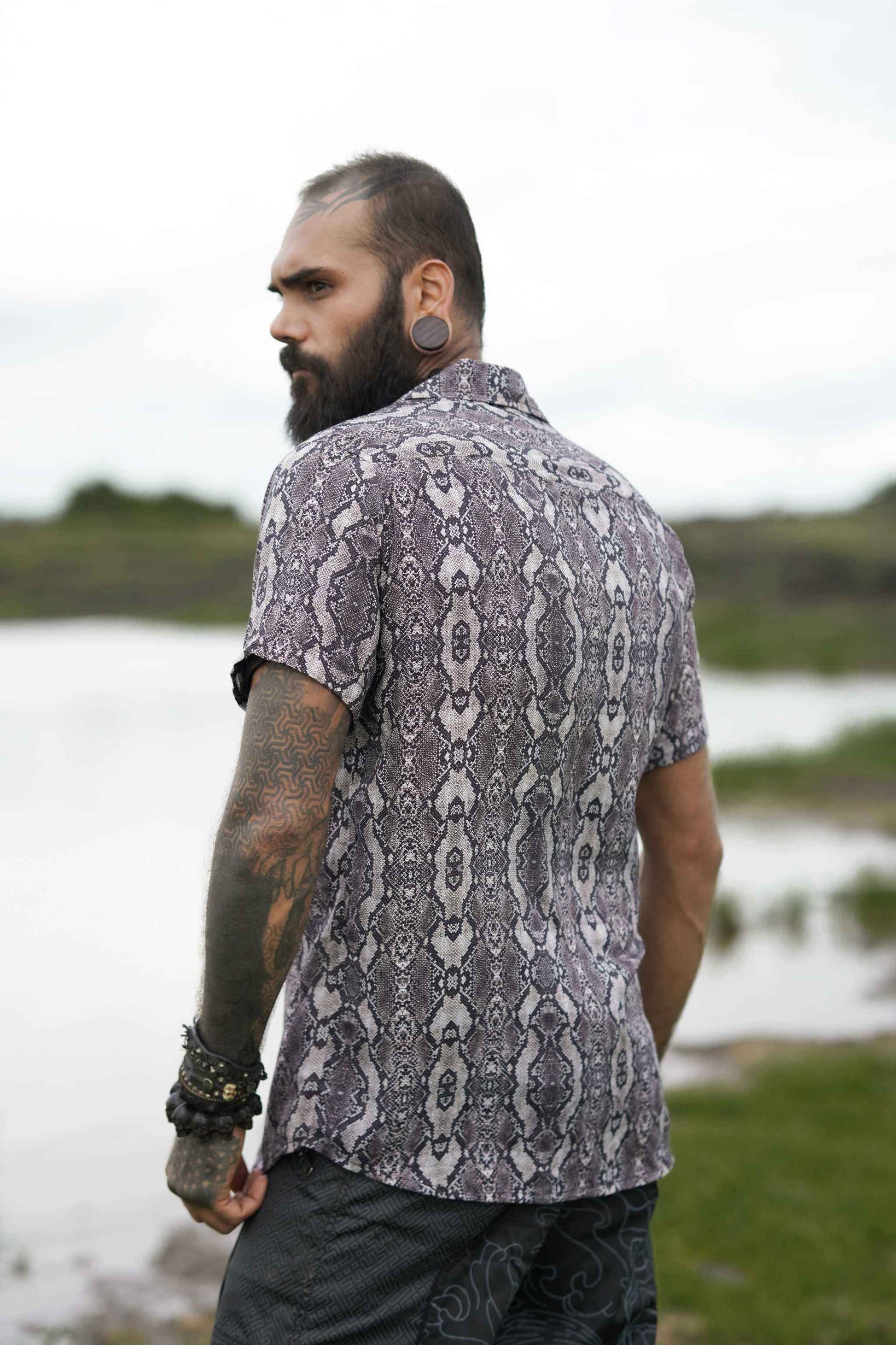 Detail shot of sustainable bamboo shirt with psychedelic python print

