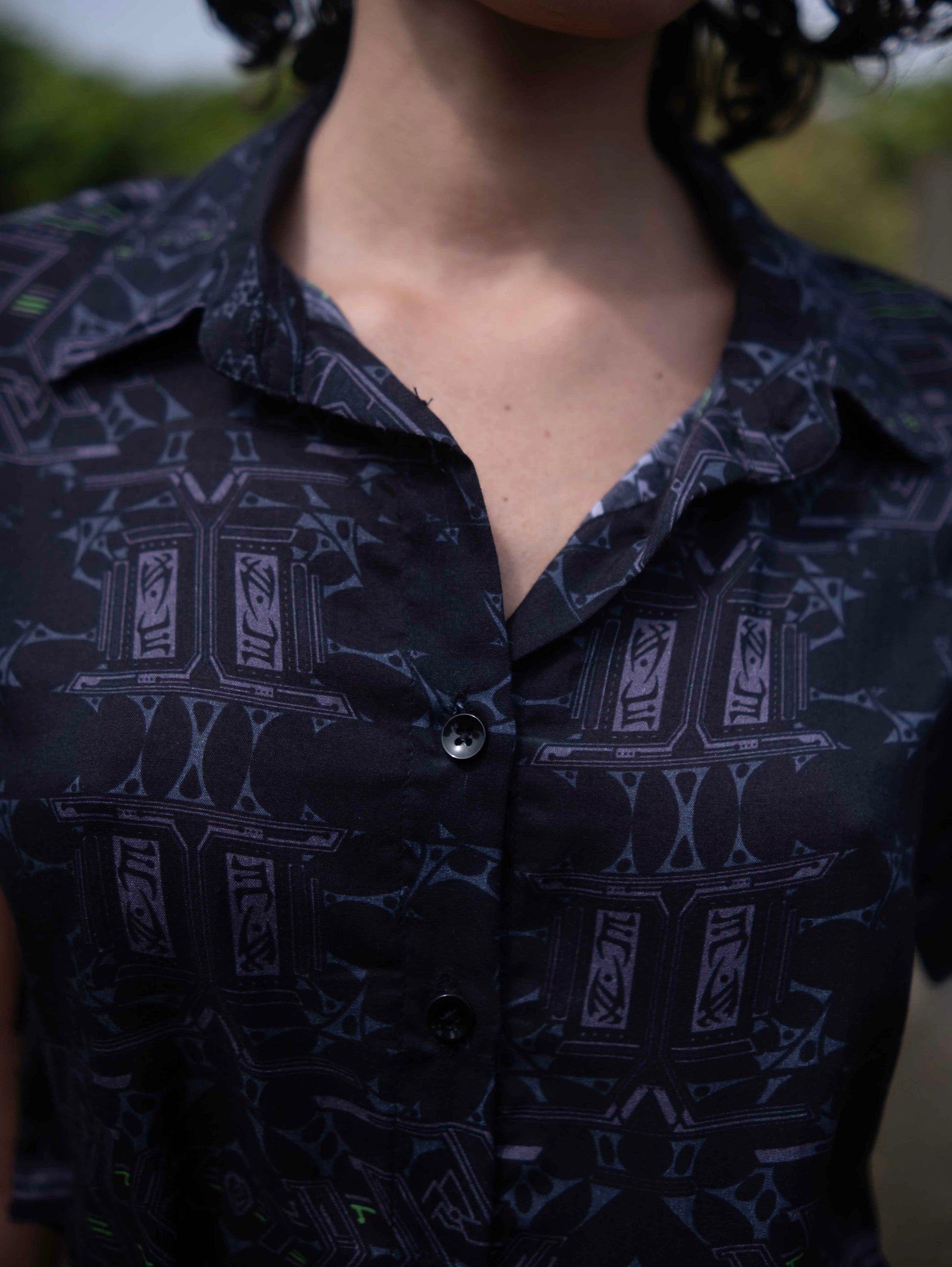 Model wearing Xenomorph abstract cropped shirt made from bamboo fabric